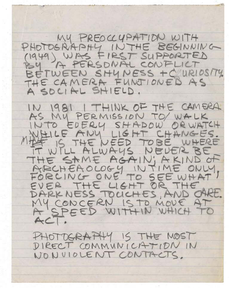 Robert Rauschenberg's photography statement, a handwritten draft from January 1981. It is written in capitals on lined note paper. It reads: "My preoccupation with photography in the beginning (1949) was first supported by a personal conflict between shyness + curiosity. The camera functioned as a social shield. In 1981 I think of the camera as my permission to walk into every shadow or watch while any light changes. Mine is the need to be where it will always never be the same again; a kind of archeaology in time only, forcing one to see what ever the light or the darkness touches, and care. My concern is to move at a speed within which to act. Photography is the most direct communication in nonviolent contacts."