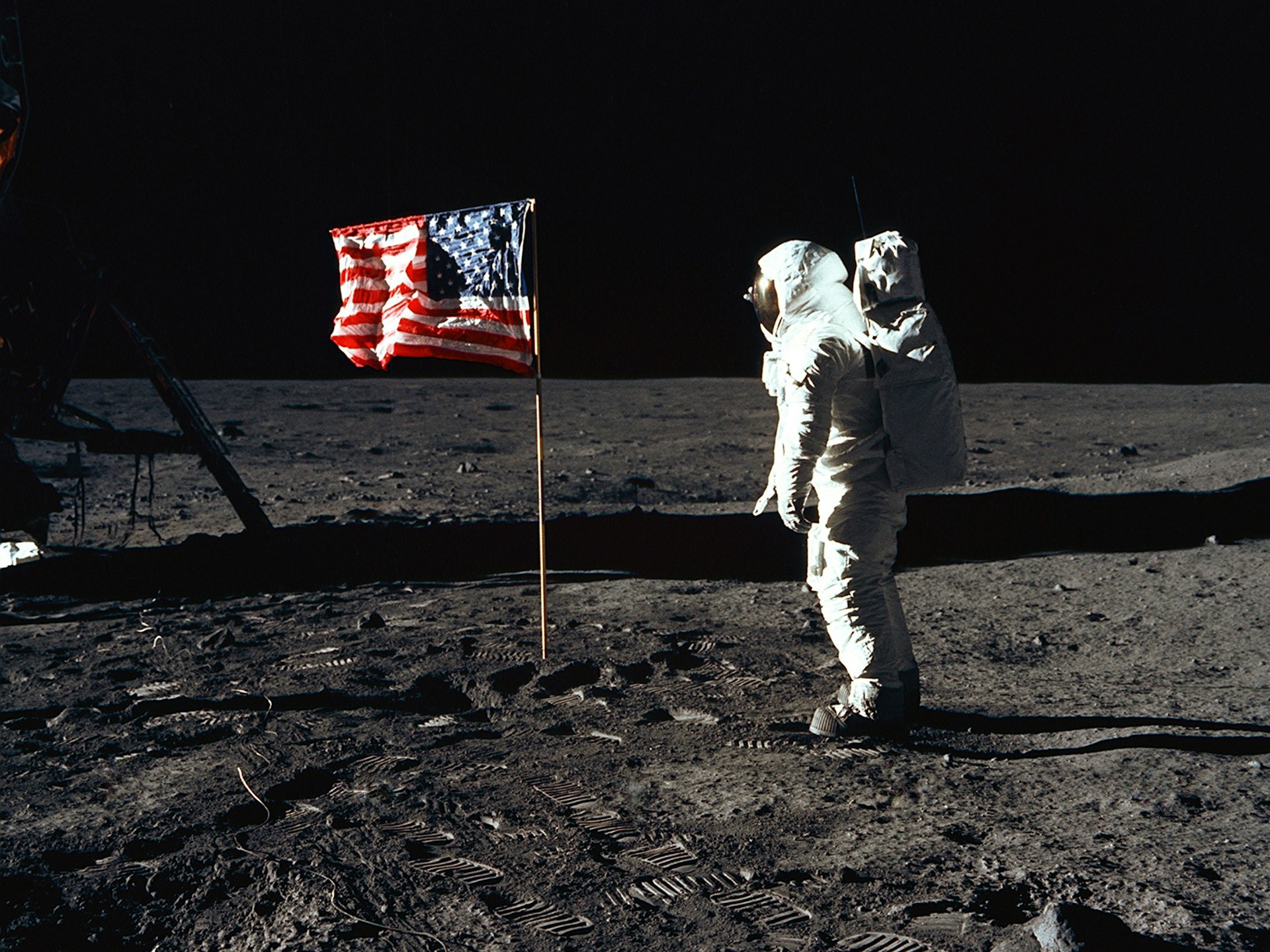 Nasa photo: Astronaut Buzz Aldrin, lunar module pilot of the first lunar landing mission, poses for a photograph beside the deployed United States flag during an Apollo 11 Extravehicular Activity on the lunar surface.