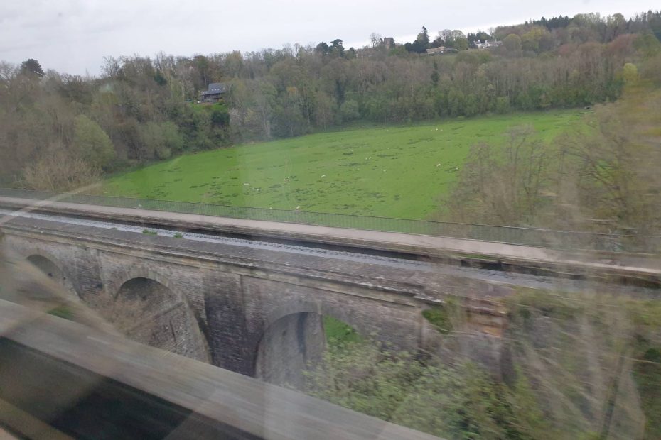 A slightly blurry Pontcysyllte Acqueduct seen from the train that runs alongside it.
