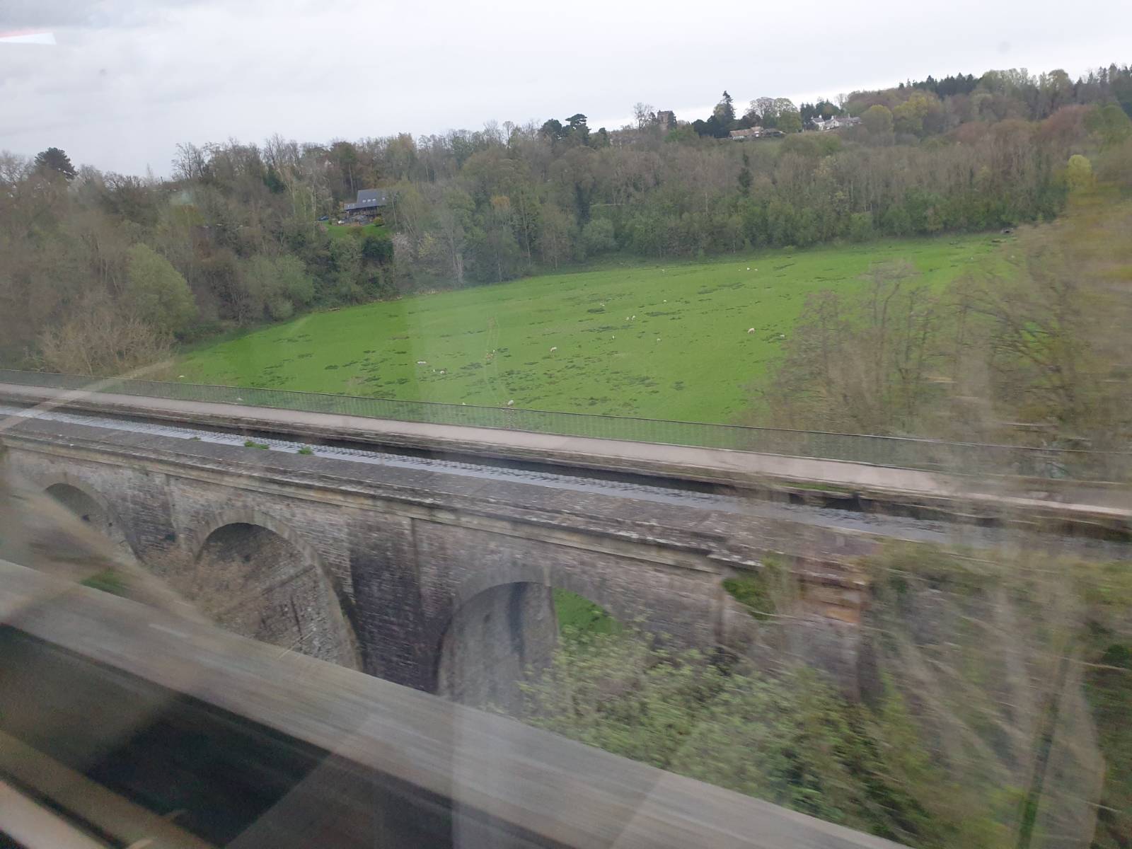 A slightly blurry Pontcysyllte Acqueduct seen from the train that runs alongside it.